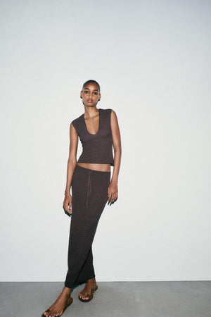 BUTTONED KNIT WAISTCOAT WITH COVERED BUTTONS