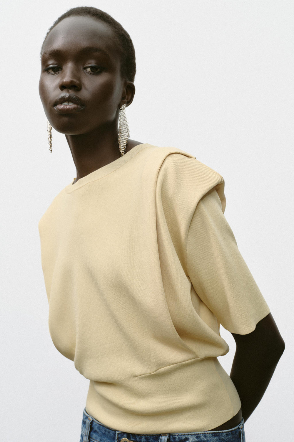 KNIT TOP WITH SHOULDER PADS